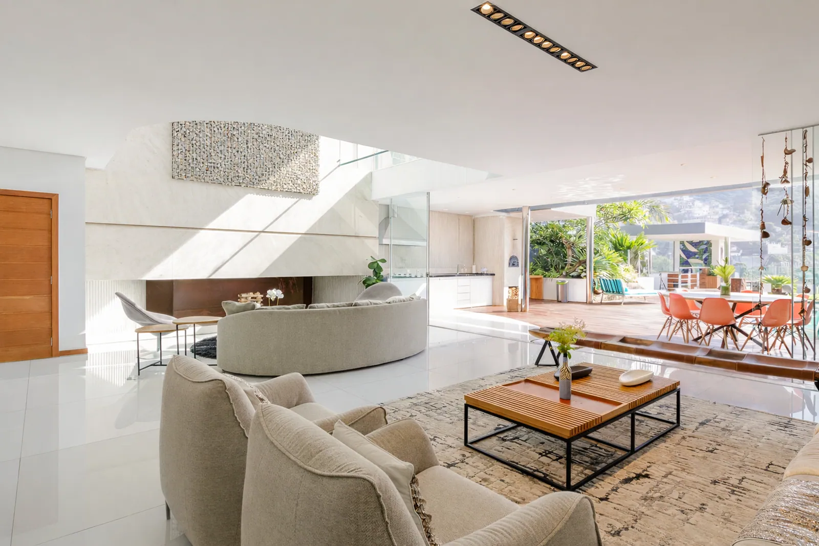 The living room opening onto the dining area and the terrace
