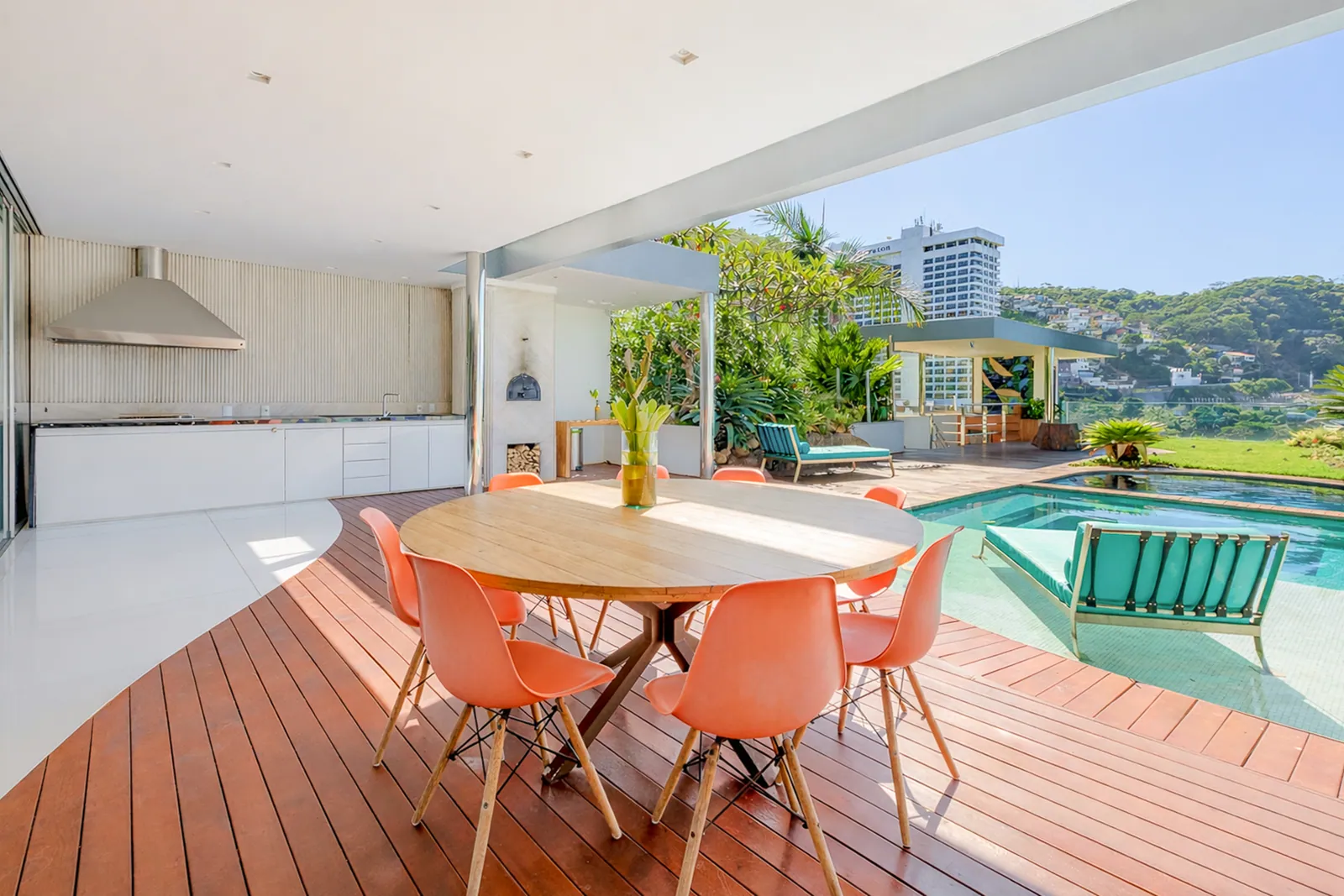 The outdoor kitchen and barbecue beside the pool