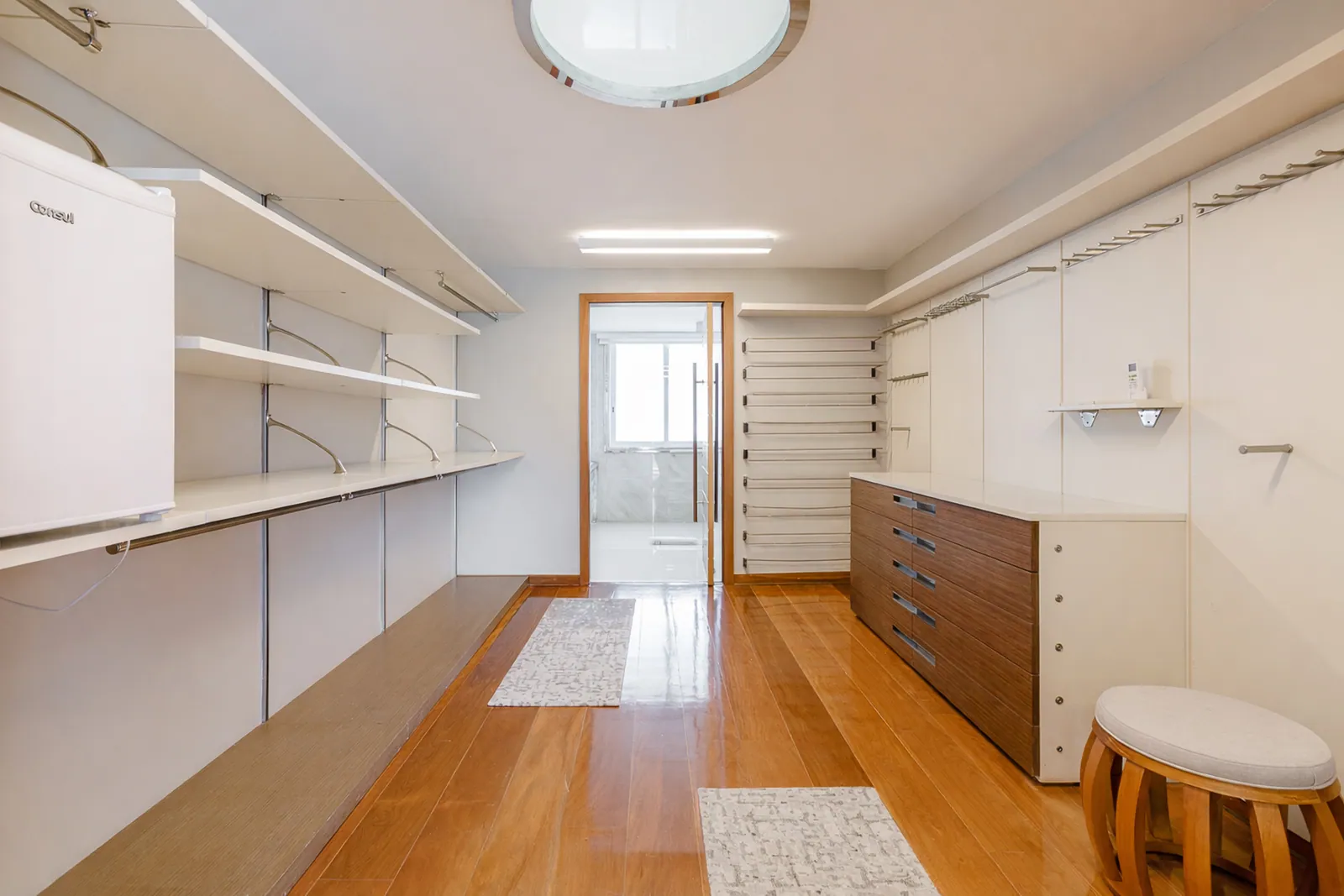Dressing room with open shelving and drawers